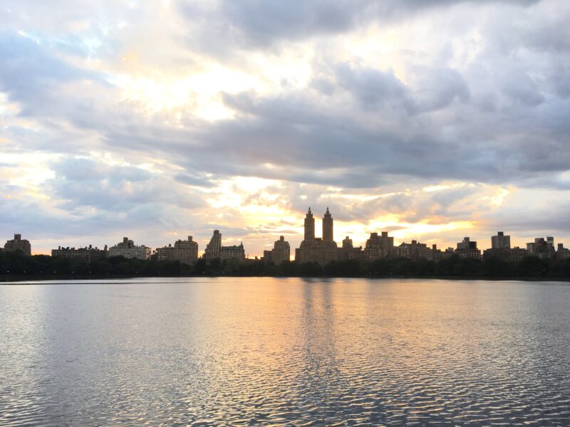 The view of Central Park West as the sun sets across the Jacqueline Kennedy Onassis Reservoir